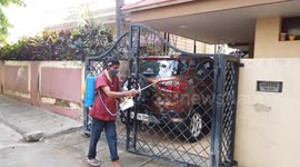 Local authorities spray disinfectant in public places to curb spread of coronavirus in south India