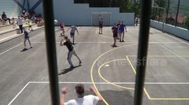 The ball flies towards the camera lens