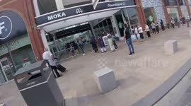 Coronavirus: Shoppers queue outside Preston Fishergate Shopping Centre