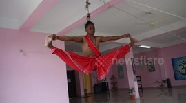 Indian yoga master's hair-raising stunt will leave you the opposite of calm