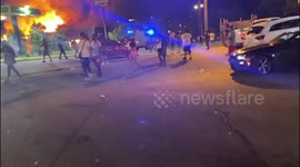 Tensions between Atlanta citizens and police laid bare in video that shows Wendy's on fire after black man is shot dead by police