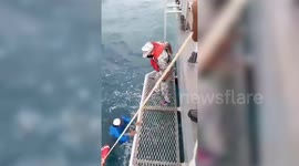 Thai fishermen rescued after boats sink during stormy seas off island