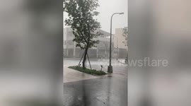 Wind and heavy batters Taiwan causing flash floods