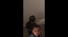 'Who wrote on the wall?' Amusing moment naughty twin boys get evasive with dad