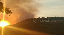 Planes drop flame retardant on Avila fire in California
