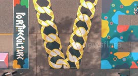 Newsflare Edit - Artists paint giant Black Lives Matter mural on the street in Seattle