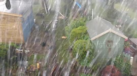 Torrential rain and hail descend on northern England