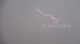 Lightning strikes hit Birmingham as storms roll across the UK