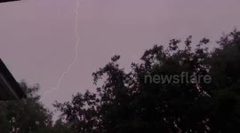Lightning flashes across stormy Manchester sky
