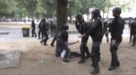 Riot police violently arrest nurse during demonstration in Paris