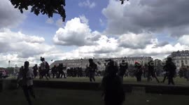 Police targeted by barrage of projectiles during clashes in Paris