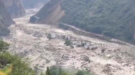 Tens of thousands of people evacuated after landslide dam causes flooding in Chinese city