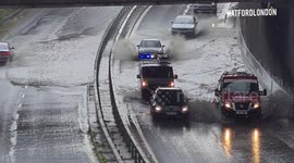 Torrential rain downpour floods roads in Hertfordshire, UK
