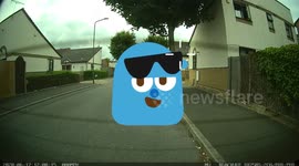 British Policeman Does a Perfect Wheelie on a Quiet Residential Street
