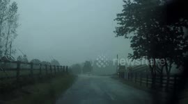 Thunderstorm and heavy rain pelt roads in UK