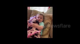 Sweet moment in Florida when sister meets her newborn 'NICU graduate' sister for the first time