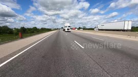 Trucks rolling on Ontario highway 401 as the economy slowly moves to stage 2 of opening up after COVID 19 pandemic