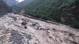 Natural barrier lake breaches dam submerging southern Chinese villages