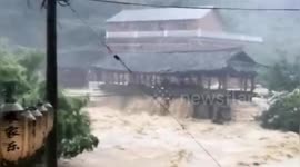 400-year-old bridge washed away by flash floods in southern China