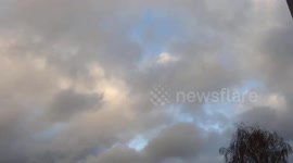 Blue sky white clouds black clouds timelapse