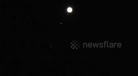 Jupiter and its four Galilean moons