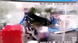 Strong winds rip off canopy seeing it slam down onto pedestrians and vehicles in southern China