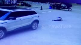 Chinese toddler luckily survives being run over by car