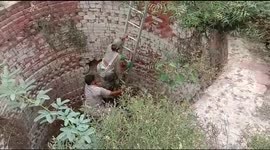 Fire officials rescued old women from 60 feet deep well in Northern India.