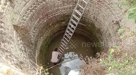 Officials rescue elderly woman who jumped into 60-feet-deep well in northern India