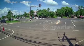 Pickup truck careers through red light before crashing into six parked cars
