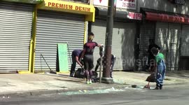 store front clean up after a recent looting in Phila