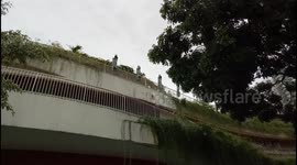 Look like Reapers! Things hanging against gated wall like a reaper