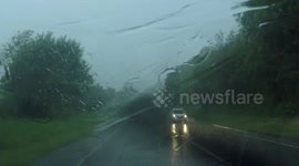 Dash Cam Captures Intense Rain Core From Thunderstorm