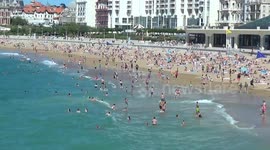 Surfers and beachgoers in France return to the sea as coronavirus restrictions eased