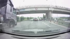Speeding Lorry Almost Hits Car In Vietnam