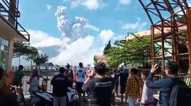 Indonesia volcano eruption ash clouds rise into the sky