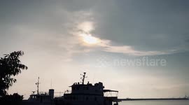 Time lapse shows rare solar eclipse darken Philippines on the summer solstice