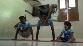 Yoga students show off unbelievable balance and body control