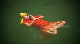 Cop celebrates Yoga Day by performing poses on water's surface in India