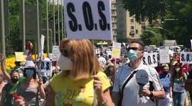 Thousands of tourism workers demonstrate in Madrid
