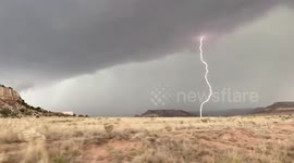 Storm chaser catches lightning in a bottle with slo-mo shot in Sheep Pen Canyon