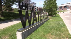 University of Waterloo plants rainbow pride flags all around campus at the time convocation would normally take place but isn't this year due to COVID 19