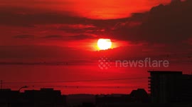 Hot weather and fireball red sunset in Markham just north of Toronto