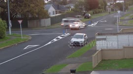 BMW travelling on wrong side of the road crashes car into an oncoming van in New Zealand