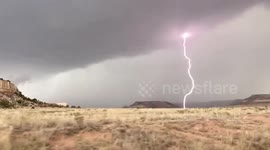 Stormchaser catches lightning in a bottle with slo-mo shot in Colorado's Sheep Pen Canyon