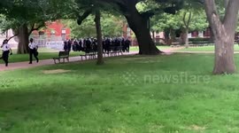 Lines of Police marching into Lafayette Square to stop protesters tearing down statue