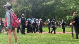 Police encircling statue as protesters try to tear it down