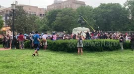 Protesters vs. police in Lafayette Square during attempts to tear down statue