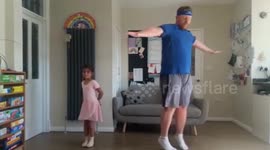 Group of dads join in their children's online ballet class