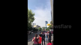 Crowd seen on street in Mexico City after 7.4 quake hits south of the country